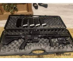 specna h08 upgraded with 4 mags and sight, as well as case