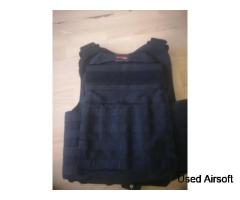 Black Safariland body armour with Kevlar inserts