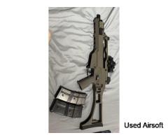 G36C with 2 mags and red dot sight
