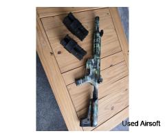 Delta Armoury M4 with four midcap
