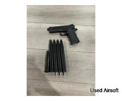 Tokyo Marui 4.3 Hi Capa with box, 4 extended mags, and 1 regular mag - Image 2