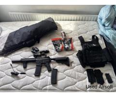 Heavily upgraded SA-E06 with airsoft gear