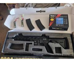 2 Airsoft guns and batteries and charger
