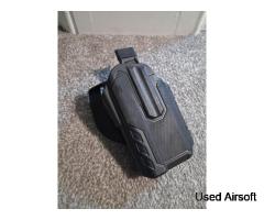 GloK holster with attachment space