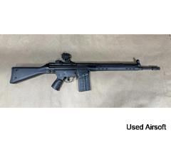 Airsoft LCT G3 Rifle with a Holosun Red Dot and Riser