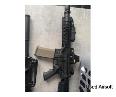 2 air rifles with attachments