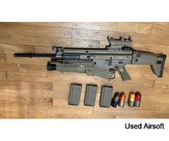 Tokyo Marui SCAR-H EBB with VFC grenade launcher and grenades.