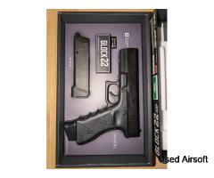 Tokyo Marui Glock 22, with 2 mags. 1 mag leaking