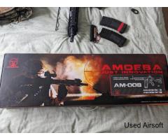 Amoeba AM-008 rifle in box with accessories