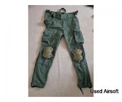 Olive drab trousers with knee pads