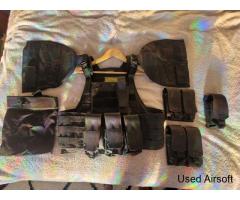 Black molle tactical vest plate carrier with shoulder armour and mag pouches - Image 1