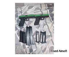 2 glock 18s with 7 magazines  open to offers
