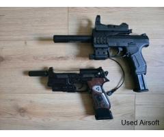1x Walther P99 Spring and 1x Bretta m92f both with imitation silencers + extra magazine for Bretta