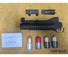 M203 under barrel grenade launcher with 4 shells