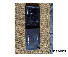 Tokyo Marui Curve stealth pistol mint condition with spare mag - Image 1