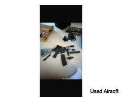 Firehawk airsoft gun with attachments