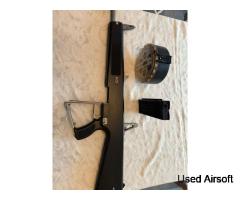 Tokyo Marui AA12 auto shotgun, drum mag and 90 round mag with battery