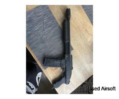 Tm m870 breacher shotgun