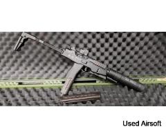 HPA/GBB KWA MP9 with silencer and tracer adapter.