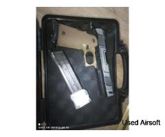 Army Armaments Hi-Capa gas pistol.