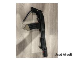 Tokyo Marui how airsoft breacher shotgun with m4 mag adapter, tracer, and shells - Image 2