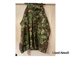 British Army DPM combat clothing, including zip-up combat shirts and trousers.