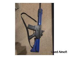 6mm full auto assault rifle with a upgraded sights